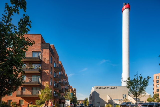 Eastman Village in Harrow, with apartment buildings and the retained chimney